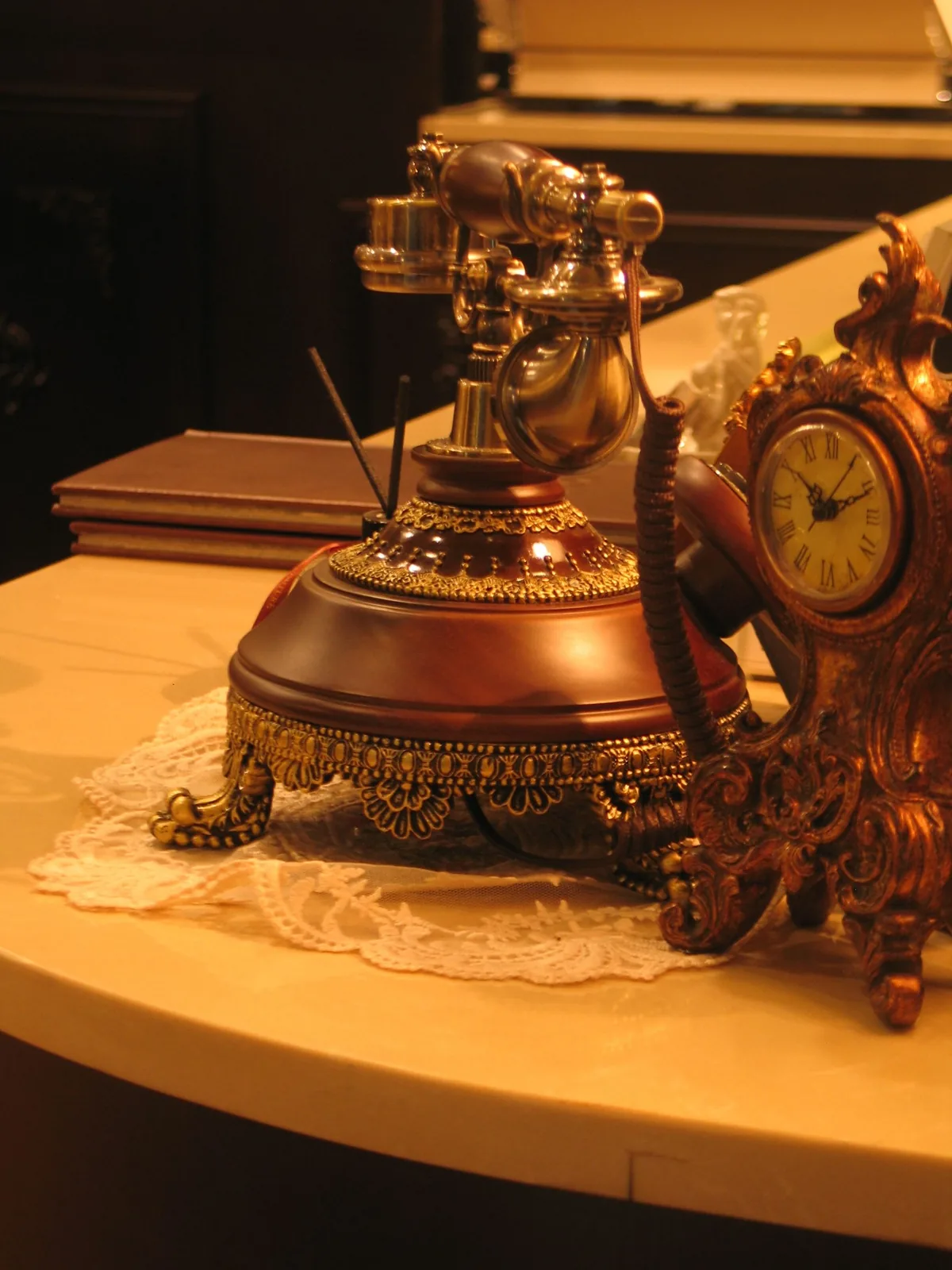 Ornate vintage telephone on a styled table, illustrating the familiar appeal of an audio guestbook phone
